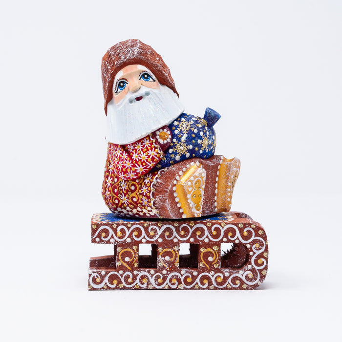 Hand-carved  Grandfather Frost Figurine on a Sled
