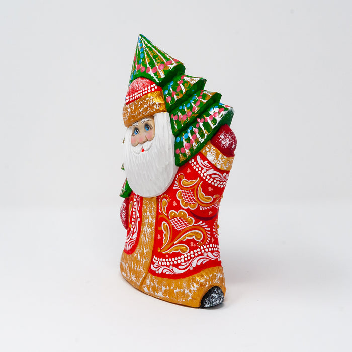 Hand-carved   Grandfather Frost with a Tree over his Shoulder
